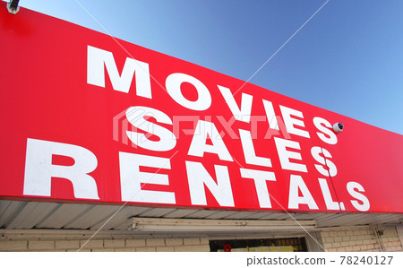 Movie Rental Sign on Convenience Store 78240127