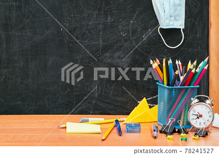 school still life, stationery on the table and a medical mask in the background school board, school, university school still life, stationery on the table and a medical mask in the background school board, school, university 78241527