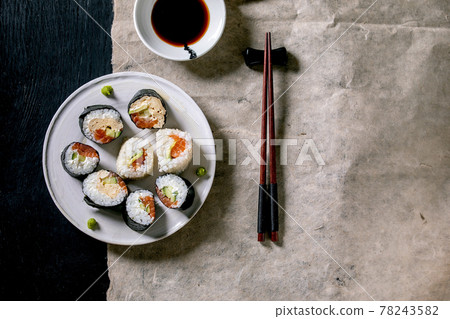 Homemade sushi rolls set with salmon, japanese omelette, avacado and soy sauce 78243582