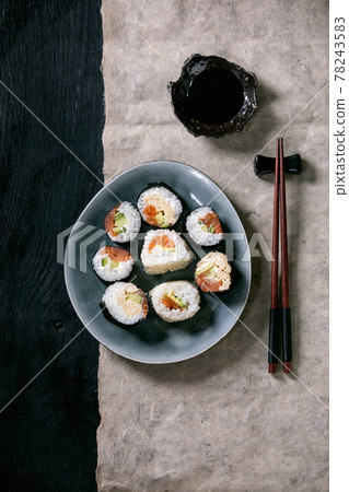 Homemade sushi rolls set with salmon, japanese omelette, avacado and soy sauce 78243583