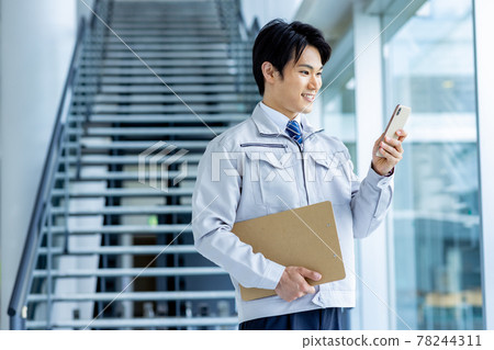 Businessman work clothes smartphone Businessman work clothes smartphone 78244311
