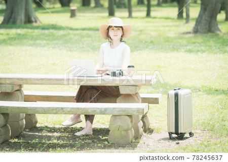 A young woman worcation in the fresh green 78245637