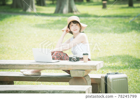 A young woman worcation in the fresh green A young woman worcation in the fresh green 78245799