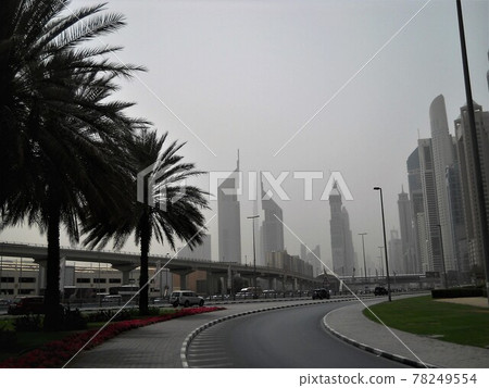 Skyscrapers hazy in fog (Dubai) 78249554