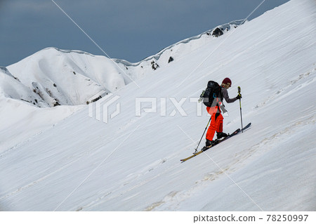 Skiing in the Tateyama mountain range in the Northern Alps in spring Skiing in the Tateyama mountain range in the Northern Alps in spring 78250997