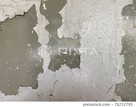 The metal iron surface of the sheet is old shabby shabby with rust and painted with gray paint. The background. Texture The metal iron surface of the sheet is old shabby shabby with rust and painted with gray paint. The background. Texture 78252795