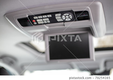 screen multimedia system control panel. Interior detail of modern luxury car dashboard with big display and light button switch on ceiling. Screen multimedia system screen multimedia system control panel. Interior detail of modern luxury car dashboard with big display and light button switch on ceiling. Screen multimedia system 78254165