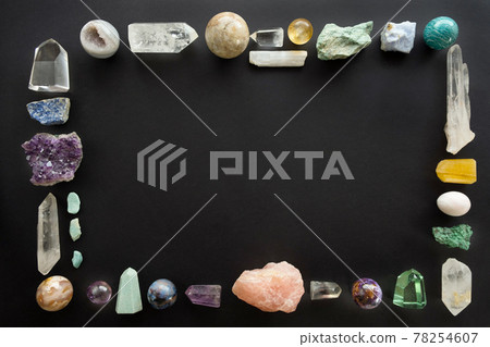 Frame made of crystal stones on black background. Colorful gemstones and crystals on dark background with copy space. Frame made of crystal stones on black background. Colorful gemstones and crystals on dark background with copy space. 78254607