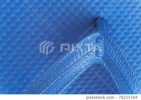 Close-up rubber colored flip-flops, webbed for fingers, coarse t 78255104