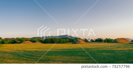 Sunset of Inwang-dong ancient tomb complex in Gyeongju, Korea 78257796
