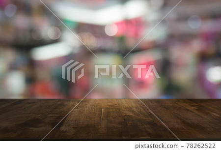 Empty wooden table in front of abstract blurred background of coffee shop . can be used for display or montage your products.Mock up for display of product Empty wooden table in front of abstract blurred background of coffee shop . can be used for display or montage your products.Mock up for display of product 78262522