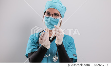 Young doctor has a PCR test in her hands Young doctor has a PCR test in her hands 78263794