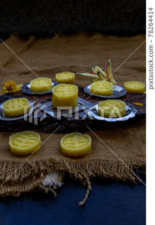 A dish of Delicious Thai Traditional Dessert called Thua Kwan (Mung Bean Cookies). A dish of Delicious Thai Traditional Dessert called Thua Kwan (Mung Bean Cookies). 78264414