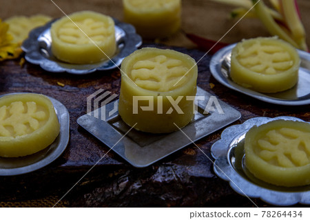 A dish of Delicious Thai Traditional Dessert called Thua Kwan (Mung Bean Cookies). A dish of Delicious Thai Traditional Dessert called Thua Kwan (Mung Bean Cookies). 78264434
