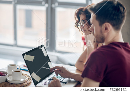 Team members working on a project together 78266181