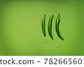 green monochrome with three green peppers on a background 78266560