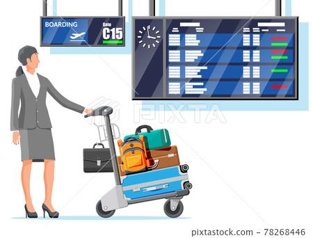 Woman and Hand Truck Full of Bags in Terminal. 78268446