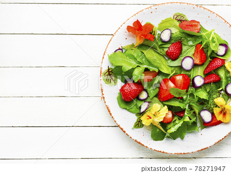 Summer salad with berries and herbs Summer salad with berries and herbs 78271947