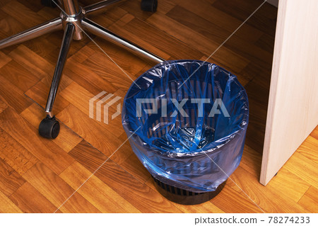 Trash bin under the desk in the office 78274233
