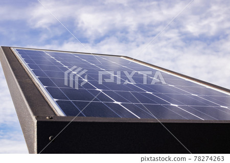 Solar panel on a blue sky background 78274263
