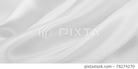 Smooth elegant white silk or satin luxury cloth texture as wedding background. Luxurious background design Smooth elegant white silk or satin luxury cloth texture as wedding background. Luxurious background design 78274270