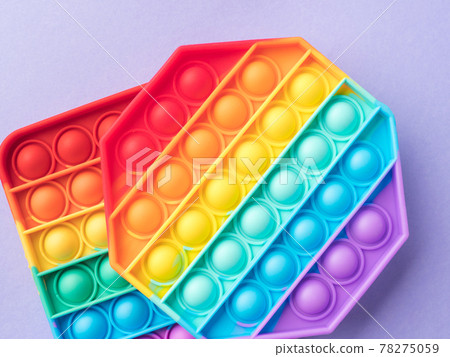 Pop it fidget toys to help reduce stress and anxiety in kids and adults 78275059