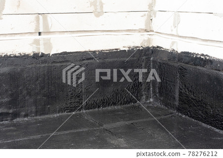 Waterproofing flat roof terrace with roll bitumen Waterproofing flat roof terrace with roll bitumen 78276212