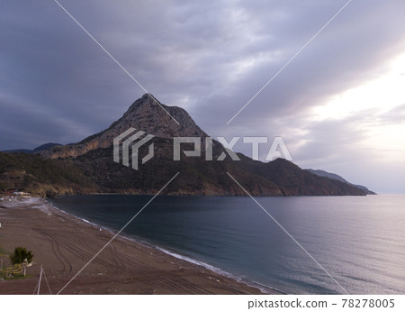 Aerial Shots of Adrasan Beach at Sunrise. Seaside view from Adrasan Beach along the Mediterranean coast in Kemer, Antalya Province, Turkey 78278005