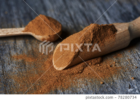 wooden spoons full of camu-camu powder wooden spoons full of camu-camu powder 78280734