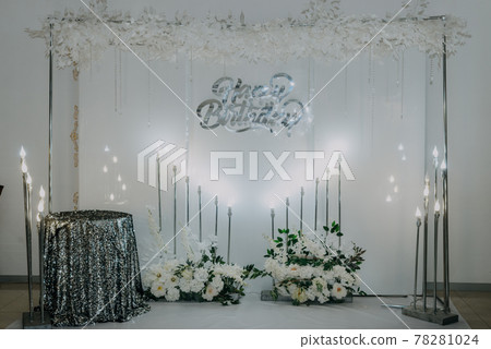 Happy Birthday decoration the photo zone on a beige background. Festive background decoration for birthday celebration. Selective focus Happy Birthday decoration the photo zone on a beige background. Festive background decoration for birthday celebration. Selective focus 78281024