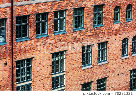 old brick office building with windows old brick office building with windows 78281321