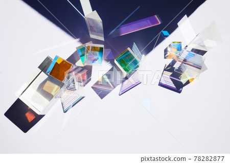 Abstract background with glass geometric figures prisms with light diffraction of spectrum colors and complex reflection. 78282877