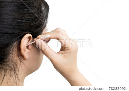 Asian woman with an itchy ears cleaning,removing the earwax in her auditory canal,lady girl using a cotton swab to clean her ear after taking a shower,concept of perforated eardrum from ear picking Asian woman with an itchy ears cleaning,removing the earwax in her auditory canal,lady girl using a cotton swab to clean her ear after taking a shower,concept of perforated eardrum from ear picking 78282992