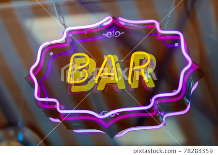 A bright glowing signboard in the evening on the showcase of A bright glowing signboard in the evening on the showcase of 78283359