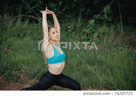 Sporty fit woman doing morning workout outdoors 78285725