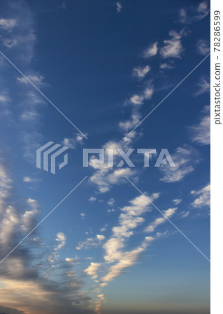 View of colorful cloudscape during dramatic sunset View of colorful cloudscape during dramatic sunset 78286599