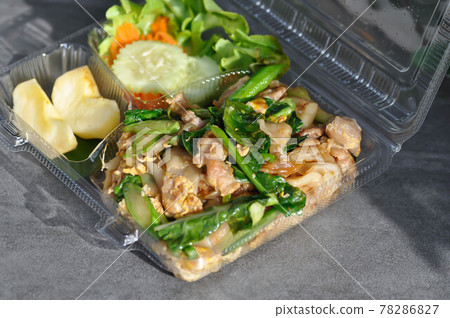 stir fried noodles with pork and vegetable in the box 78286827