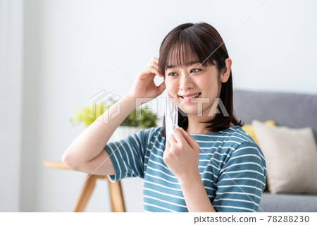 Young woman with mask Young woman with mask 78288230