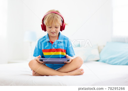 Child with tablet computer. Kids study online. Child with tablet computer. Kids study online. 78295266