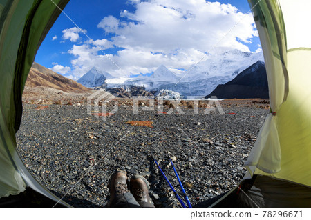 Hiker enjoy the beautiful landscape in tent Hiker enjoy the beautiful landscape in tent 78296671