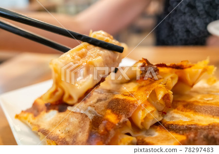 fried dumpling in a restaurant 78297483