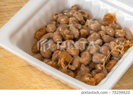 Close up Natto or Fermented Soy in foam package, melting from frozen. Close up Natto or Fermented Soy in foam package, melting from frozen. 78299820