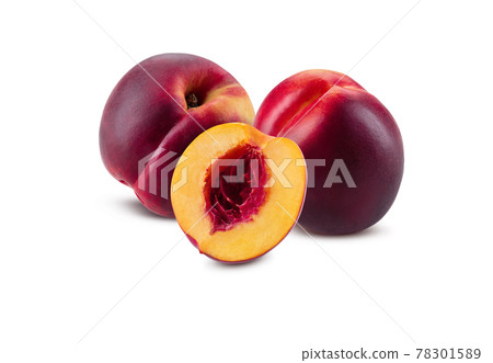 Two smooth-skinned nectarines and one half without kernel isolated on white background with copy space for text or images. Close-up shot. Two smooth-skinned nectarines and one half without kernel isolated on white background with copy space for text or images. Close-up shot. 78301589