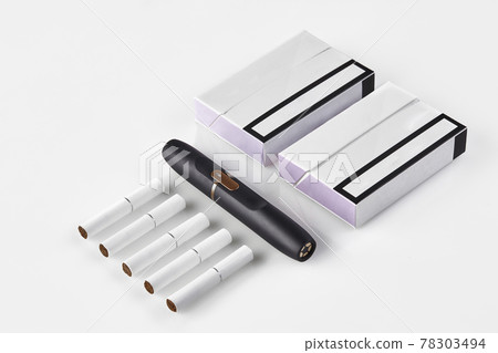 New generation black electronic cigarette, two packs with purple sides and five heatsticks isolated on white. Heating tobacco system. Close up New generation black electronic cigarette, two packs with purple sides and five heatsticks isolated on white. Heating tobacco system. Close up 78303494