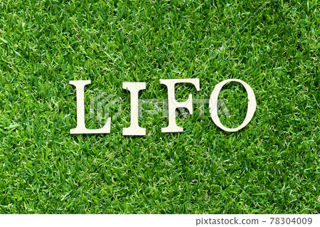 Alphabet letter in word LIFO (abbreviation of last in first out) on green grass background Alphabet letter in word LIFO (abbreviation of last in first out) on green grass background 78304009