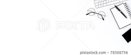 Office desktop with accessories on white table with copyspace. Panoramic banner 78308756
