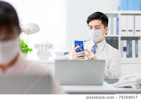 asian businessman use smartphone 78309657