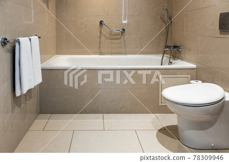 bathroom with toilet and bath in the hotel room bathroom with toilet and bath in the hotel room 78309946