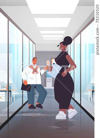 businesspeople discussing during meeting mix race colleagues couple standing together modern office interior 78310320