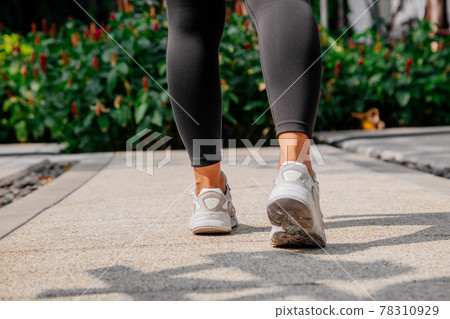 Asian sport girl doing stretching, yoga fitness and plank exercise outside. Fit young thai woman Asian sport girl doing stretching, yoga fitness and plank exercise outside. Fit young thai woman 78310929